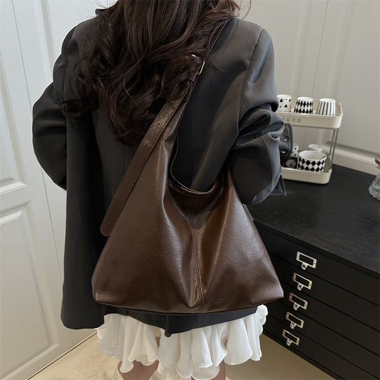 Women's large-capacity PU leather winter shoulder tote bag in a sleek, stylish design for everyday use
