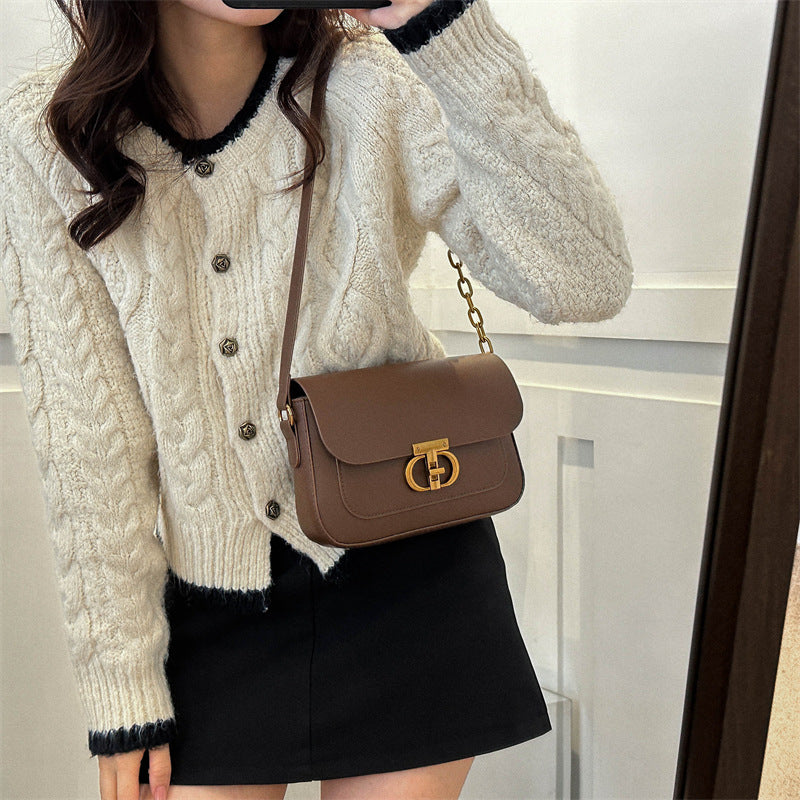 Korean-style women's shoulder bag in PU leather with a clean structured silhouette and adjustable strap for everyday wear