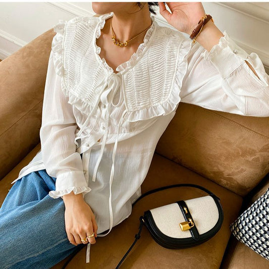 Women's Tencel ruffle trim long sleeve blouse with elegant ruffled neckline, perfect for smart casual workwear looks