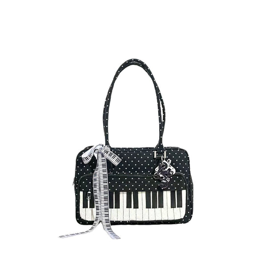 Black and white polka dot women's shoulder bag with piano key detail, lightweight cotton everyday bag