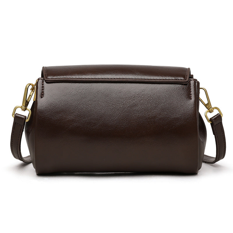 Retro PU leather crossbody bag in dark brown with multi-compartment design, styled as an everyday commuter bag for women with a minimalist urban aesthetic