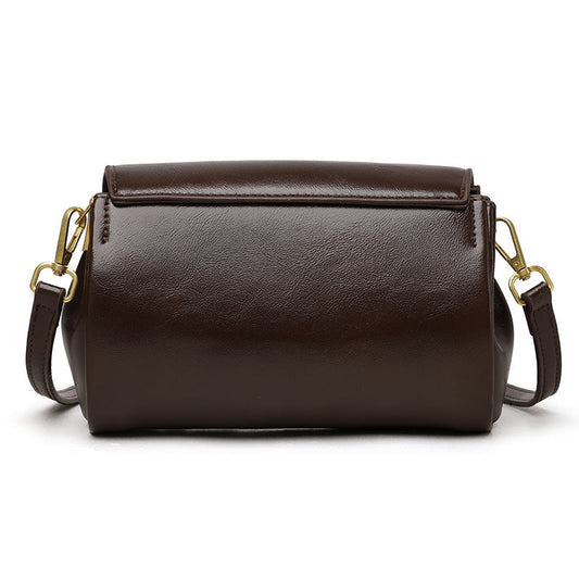 Retro PU leather crossbody bag in dark brown with multi-compartment design, styled as an everyday commuter bag for women with a minimalist urban aesthetic