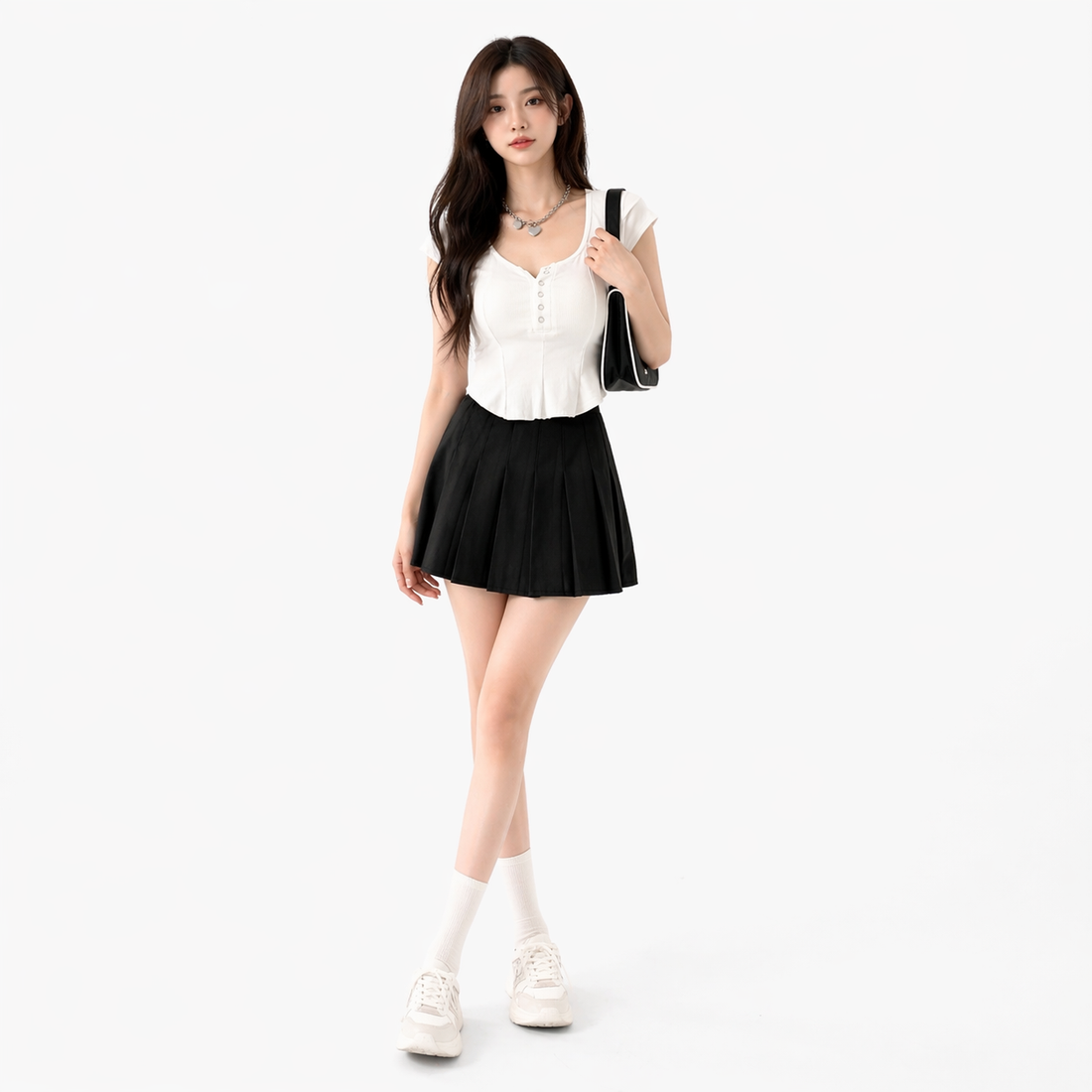 High waist pleated A-line mini skirt in a flared silhouette, styled for a feminine and polished everyday look, available in white, black, and pink from Sakurak Beauty.