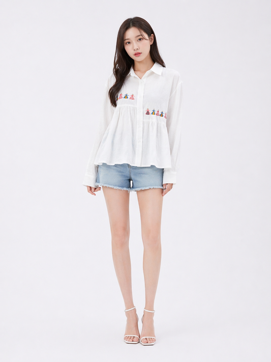 White loose fit cotton blouse with delicate embroidered cartoon details, styled as a casual everyday top for women, available in sizes S to XXL from Sakurak Beauty