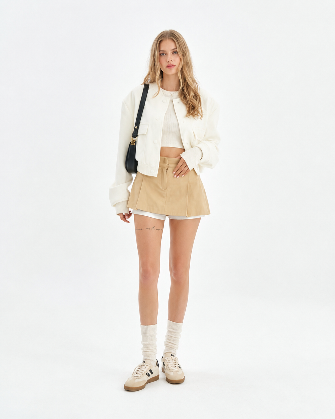 Cropped bomber jacket in a clean button-front silhouette styled for Korean street fashion, available in beige, black, and navy blue for autumn and winter layering.
