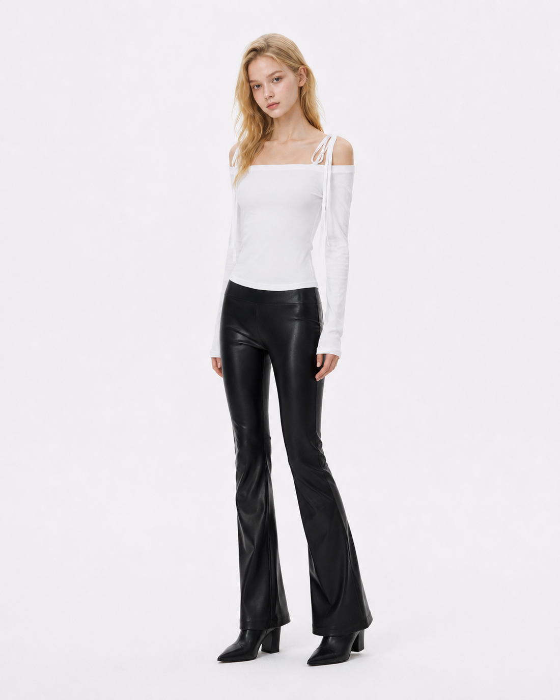 Bow-tied off-shoulder crop top with long sleeves and a soft bow neckline detail, styled as a feminine going-out look from Sakura K Beauty.