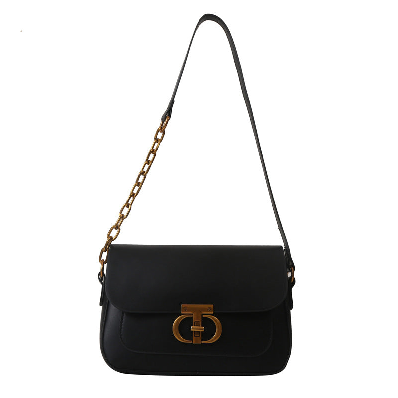 Korean-style minimalist women's shoulder bag in neutral tones displayed as a stylish everyday accessory with clean square silhouette and PU leather finish