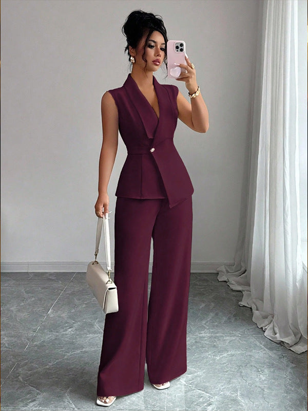 Women's sleeveless blazer and straight-leg pants two-piece co-ord set styled as a polished office outfit for modern workwear.