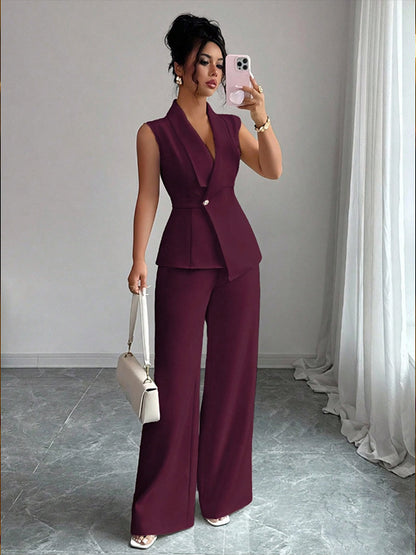 Women's sleeveless blazer and straight-leg pants two-piece co-ord set styled as a polished office outfit for modern workwear.