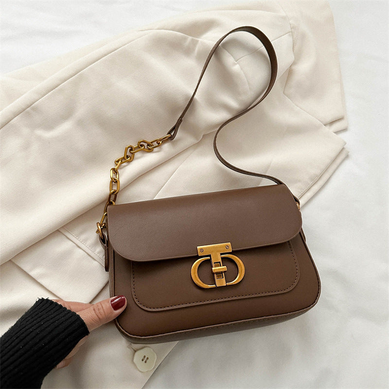 Korean-style personalized women's shoulder bag in PU leather, shown from the front as a structured everyday crossbody handbag