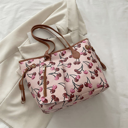 Spacious women's tote bag with underarm strap shown from the side, highlighting its large capacity and structured silhouette