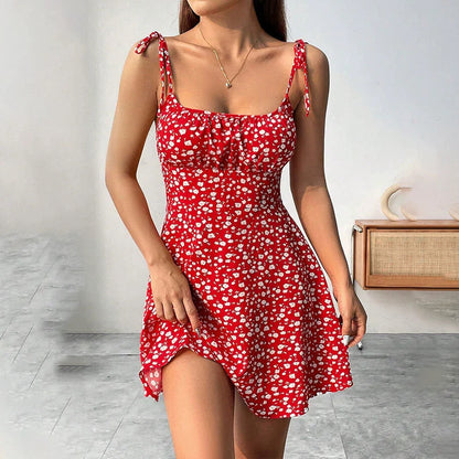 Women's floral print A-line midi dress with a relaxed casual fit, shown in a close-up detail view