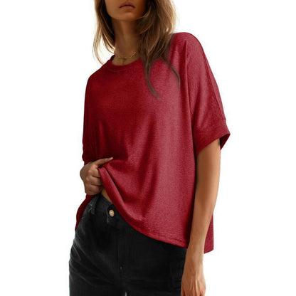 Women's batwing sleeve loose fit cotton top in khaki with a round neckline and relaxed silhouette.