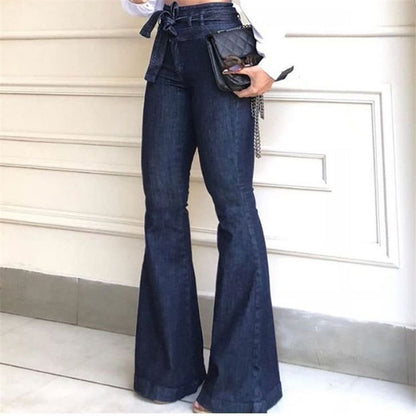 High waist wide leg denim pants with lace-up detail, shown from the side to highlight the flared silhouette