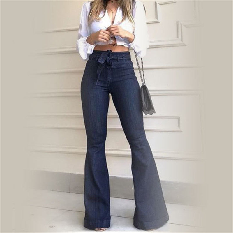 High waist wide leg denim pants with lace-up detail, shown from the front in a flared silhouette