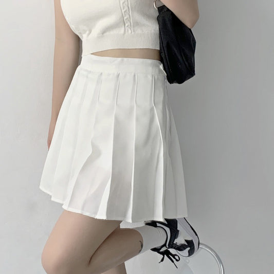 High waist pleated mini skirt with A-line flared silhouette in a solid color, shown from the front