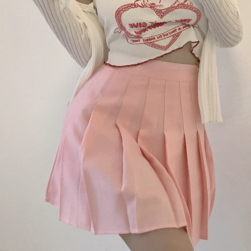 High waist pleated mini skirt with A-line flared silhouette, shown in a close-up side view highlighting the pleat detail