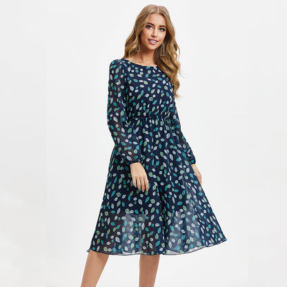 Floral print long sleeve midi dress with high waist and A-line silhouette, shown from the back