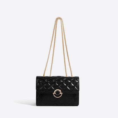 Minimalist PU crossbody bag with gold chain strap, shown in a neutral tone with a structured silhouette