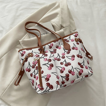 Spacious women's tote bag with underarm strap, shown from the side to highlight its large capacity and structured silhouette