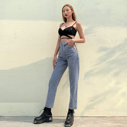 Women's high waist straight leg jeans with silver chain detail at the waist, shown in a close-up side view