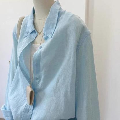 Light blue loose linen long sleeve shirt for women, shown in a relaxed casual fit with breathable fabric detail