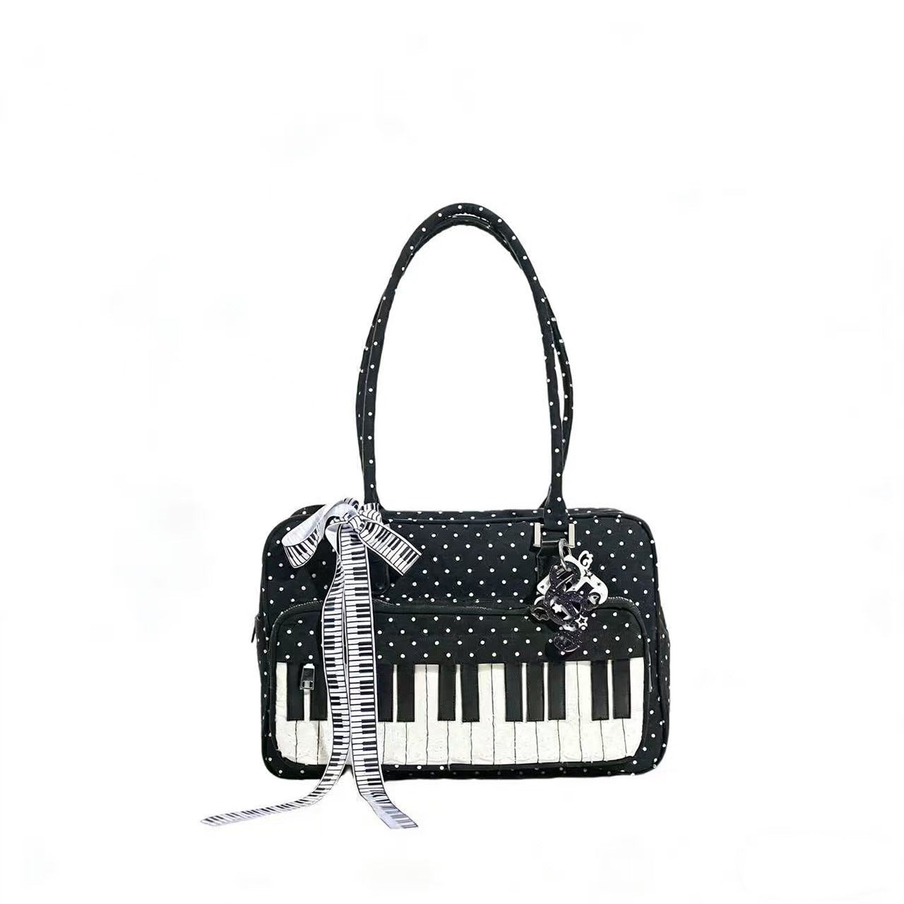 Black and white polka dot shoulder bag with piano key accent, lightweight women's everyday cotton bag