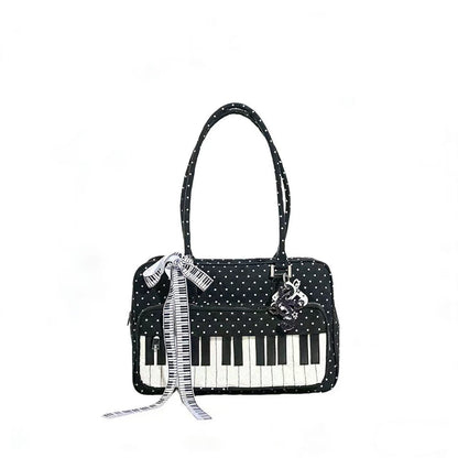 Black and white polka dot shoulder bag with piano key accent, lightweight women's everyday cotton bag