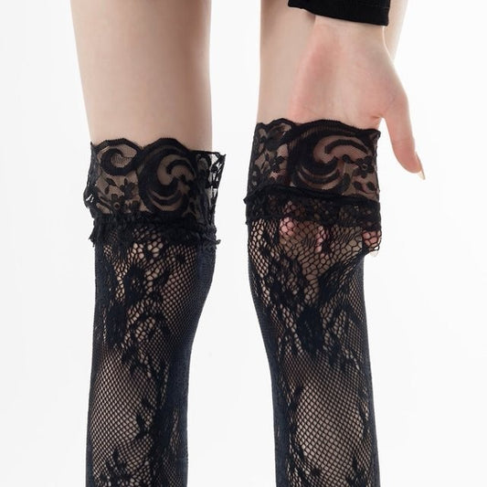 Women's sheer lace ruffle calf socks with vintage floral mesh pattern, shown in detail view