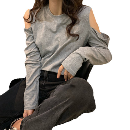 Women's off-shoulder long sleeve top in a stretch fit style, shown from a side angle highlighting the sleeve and neckline det