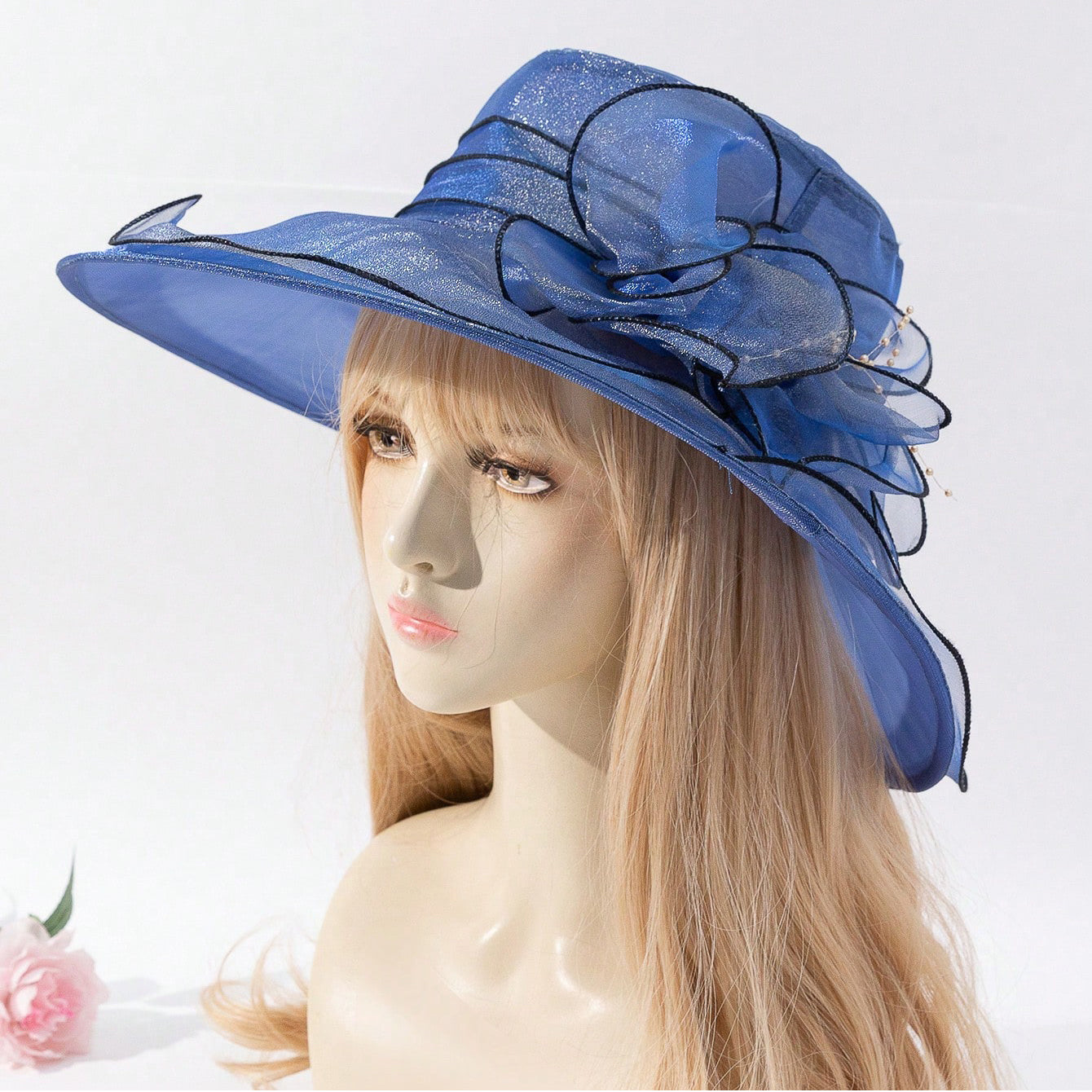 Soft chiffon women's fisherman hat with delicate flower detail, offering stylish sun protection for beach and outdoor wear.