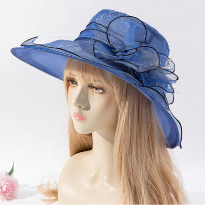 Soft chiffon women's fisherman hat with delicate flower detail, offering stylish sun protection for beach and outdoor wear.