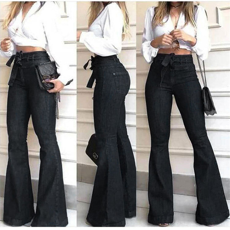 High waist wide leg denim pants with flared silhouette and lace-up detail, shown from the front