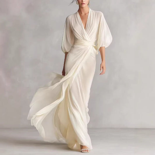 Women's slim-fit A-line long dress in a classic silhouette, styled as elegant office wear for a polished everyday look.