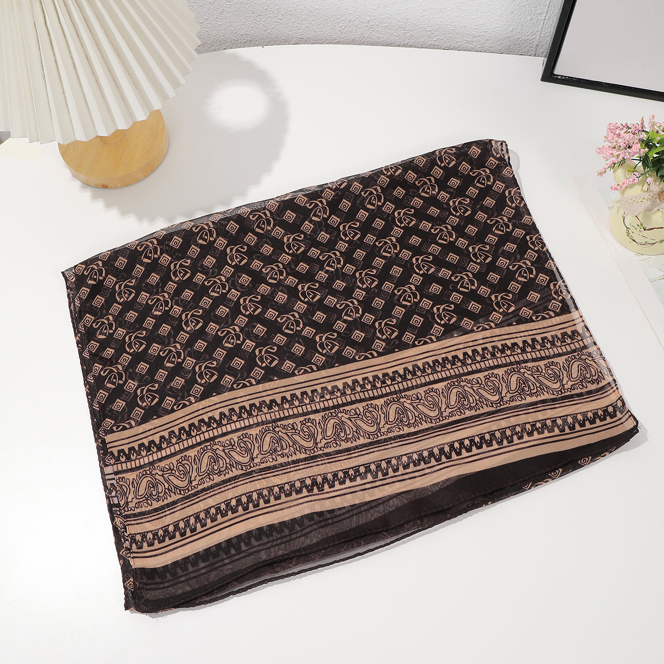 Coffee brown French vintage geometric shawl scarf folded flat, showing woven texture and retro pattern detail