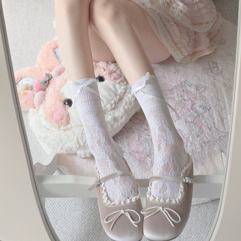 Women's Korean jacquard lace calf socks in JK style, featuring delicate woven lace detailing along the cuff