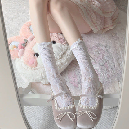 Women's Korean jacquard lace calf socks in JK style, featuring delicate woven lace detailing along the cuff