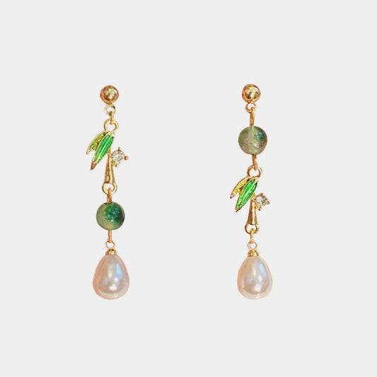 Bamboo leaf pearl drop earrings in vintage Chinese style, showing clip-on back detail and retro alloy finish