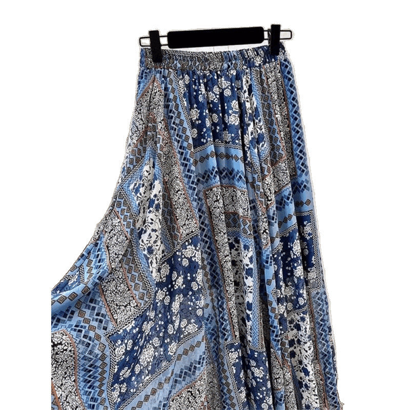 Plus size boho floral midi skirt with ethnic print detailing, shown in a flowing fairy-style silhouette