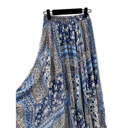 Plus size boho floral midi skirt with ethnic print detailing, shown in a flowing fairy-style silhouette