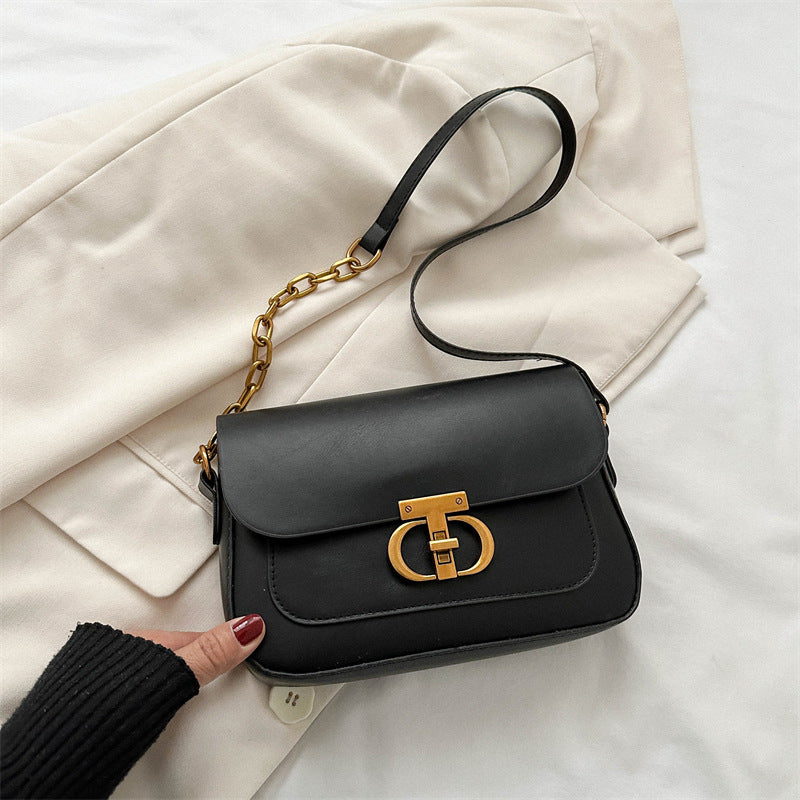 Korean-style women's shoulder bag interior view showing organized compartments and smooth lining detail