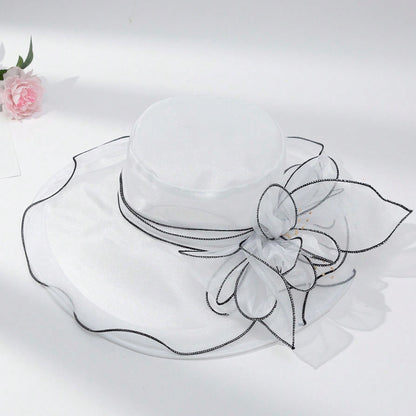 Women's chiffon fisherman hat with delicate flower trim, elegant sun-protective cap ideal for beach and vacation wear