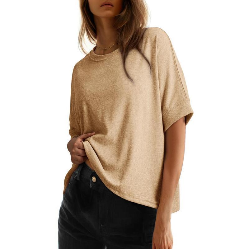 Women's batwing sleeve loose fit cotton top in light grey with round neck, shown from the front