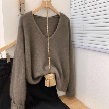 Women's loose fit v-neck pullover sweater with crochet lace trim at the neckline and hem, elegant long-sleeve knit top