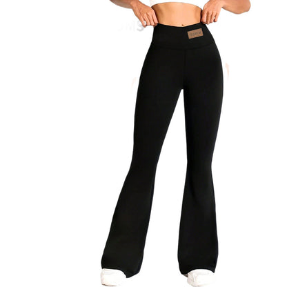 Women's high-waist yoga pants with a slim fit silhouette, featuring a wide elastic waistband and stretchy fabric for active w
