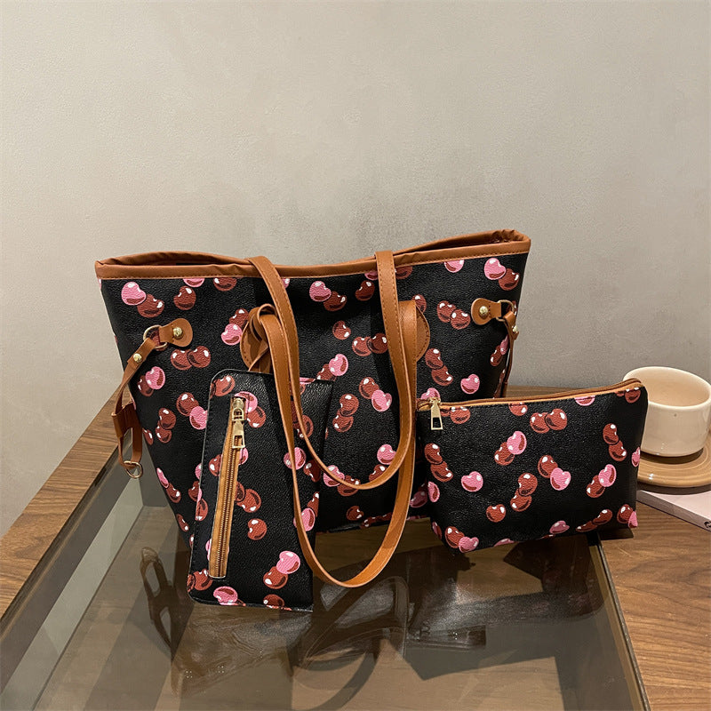 Spacious women's tote bag with underarm strap shown from the side, highlighting its large capacity and structured silhouette