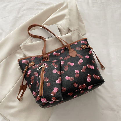 Large capacity women's tote bag with underarm strap shown from a side angle, highlighting its spacious structured design