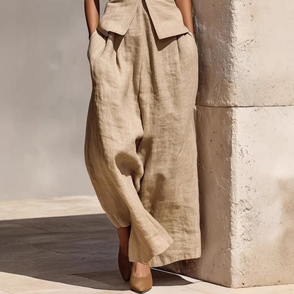 Khaki linen v-neck tank top from a women's casual co-ord set, laid flat showing relaxed sleeveless silhouette and fabric text
