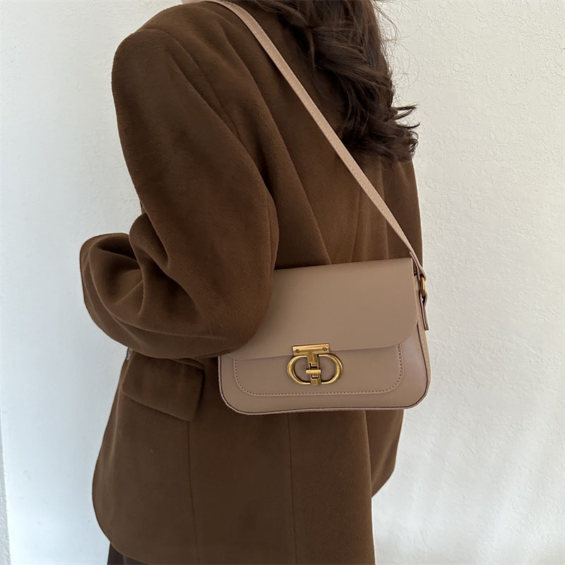 Korean-style women's shoulder bag in cream white PU leather with clean minimalist design and adjustable crossbody strap