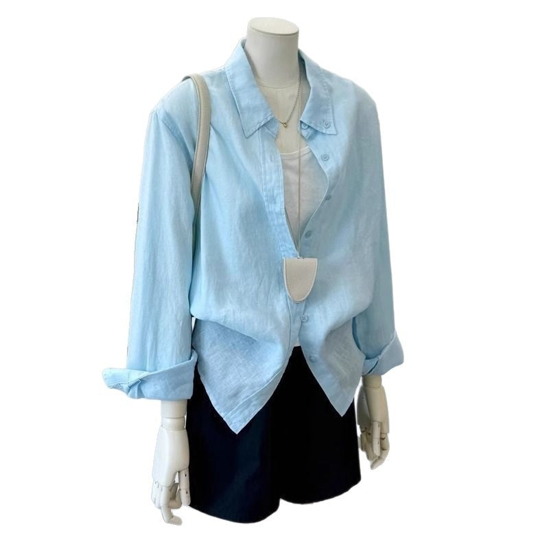 Light blue loose linen long sleeve casual shirt for women, back view showing relaxed silhouette and breathable fabric texture